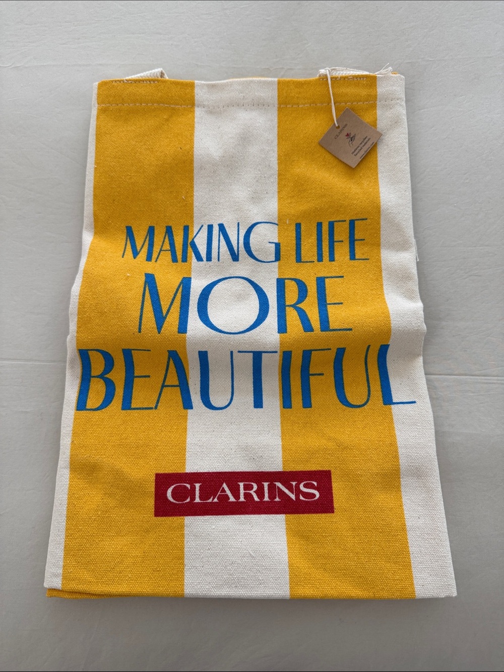 Clarins Yellow, White & Blue Striped Canvas Tote